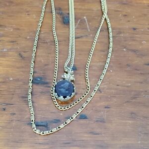 Gold-Tone Layered Necklace with Dark Purple Carved Pendant